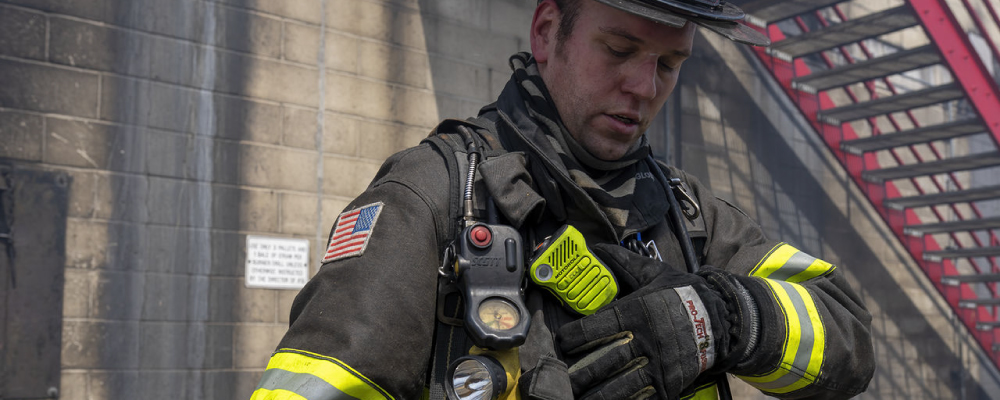 Fire Fighter Using APX NEXT XN Radio Accessories