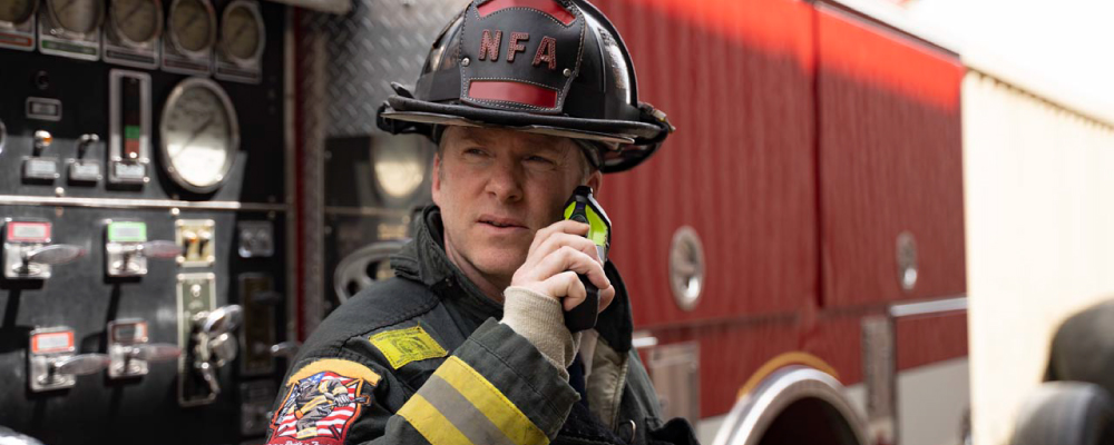 Firefighter Using the APX Next XE Radio