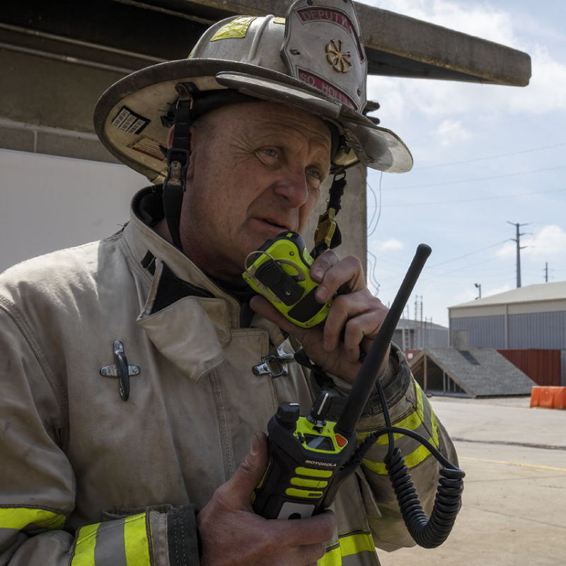 Fire Fighter Using APX NEXT XN Radio and Accessories