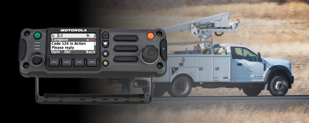 APX 4500 Mobile Two Way Radio Superimposed Over a Utility Bucket Truck