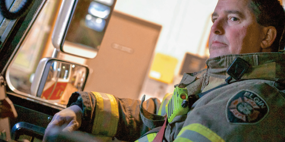 APX 6000XE Clipped to Firefighters Jacket