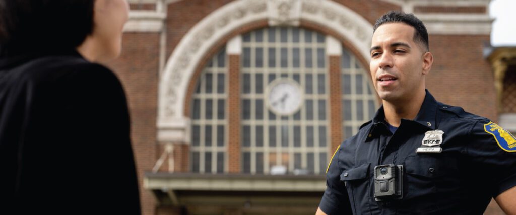 Officer Engaging the Community Wearing a V300 Body Camera