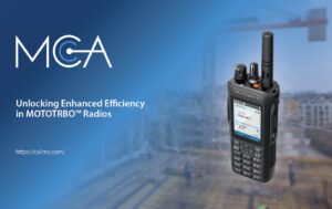 Motorola MOTOTRBO R7 two-way radio with a blurred out construction site in the background