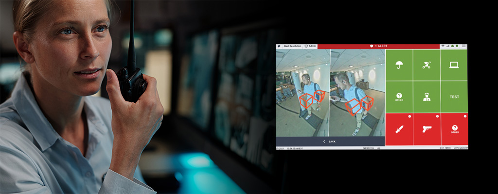 Security officer using Evolv Express® to monitor potential threats as they enter the building.