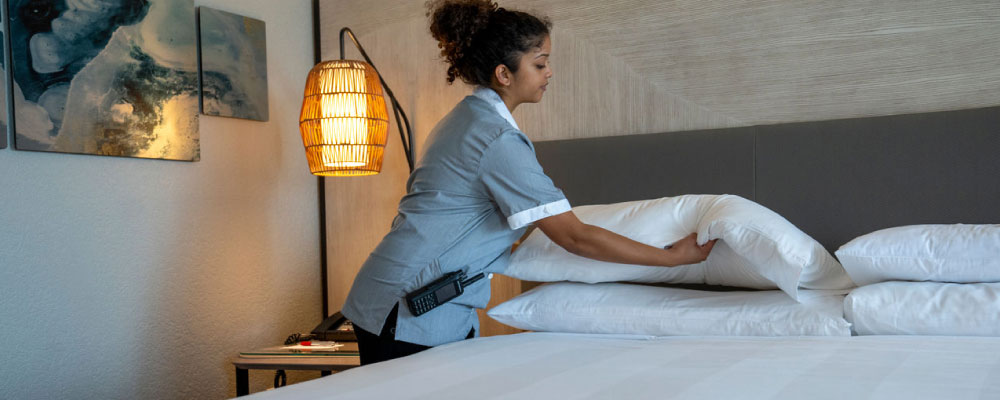 Hotel Housekeeper with Motorola Solutions Radio
