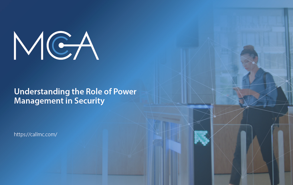 A woman using her smartphone to gain entry into a building via a access control barrier.