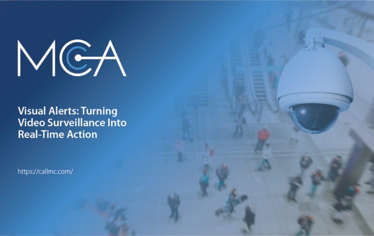 A surveillance camera watches over a crowded train station.