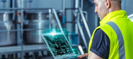 Smart,Engineer,Worker,Using,Software,On,Laptop,To,Monitor,Check